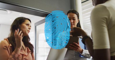 Diverse Team Collaborating in Modern Office with Digital Interface Concept