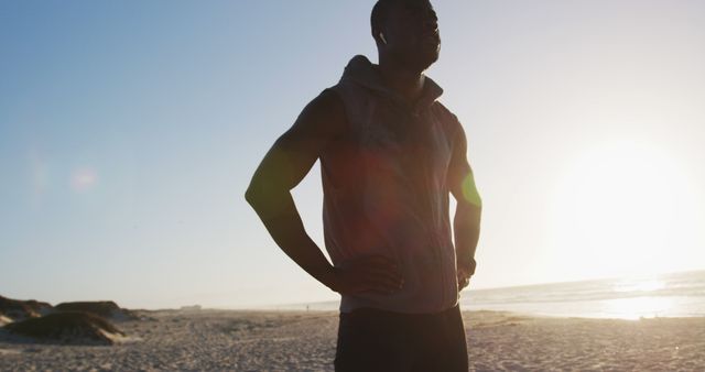 Man Enjoying Morning Beach Run, Listening to Music - Download Free Stock Images Pikwizard.com