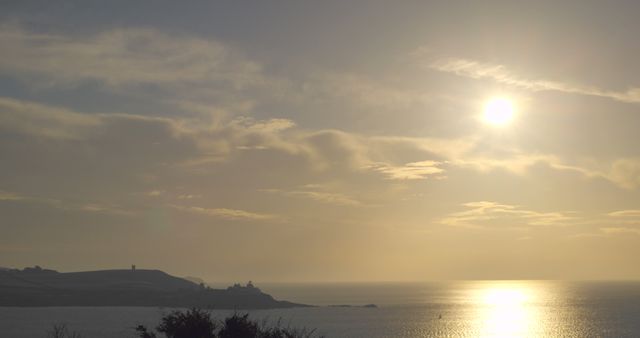 Serene Coastal Sunrise over Calm Sea - Download Free Stock Images Pikwizard.com