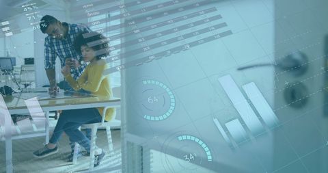 Diverse colleagues analyzing data with futuristic infographics