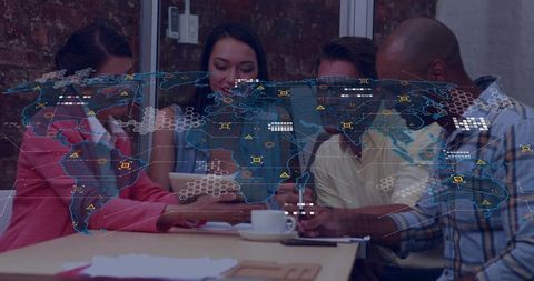 Colleagues Collaborating Over Tablet with Global Digital Map Overlay Business Analytics