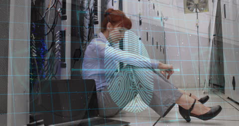 Tired Professional in Server Room with Digital Data Overlay