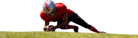 Rugby player catching ball on transparent background