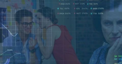 Coworkers Collaborating with Chart Overlay in Office