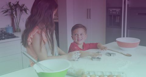 Joyful Sibling Baking Session in Modern Kitchen - Download Free Stock Images Pikwizard.com
