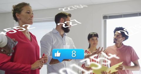 Diverse office team collaborating with social media like overlay during brainstorming
