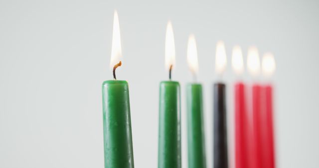 Close-Up of Lit Candles in Kwanzaa Colors - Download Free Stock Images Pikwizard.com