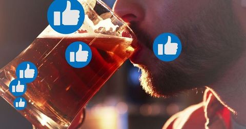 Man enjoying craft beer with social media and like icons overlay