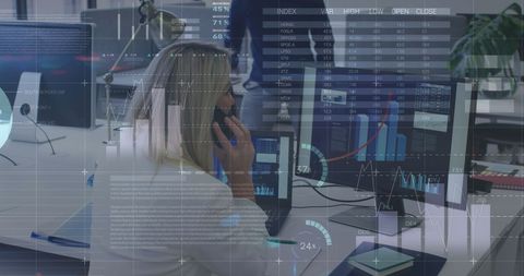 Businesswoman Analyzing Data on Office Computer Monitors - Download Free Stock Images Pikwizard.com