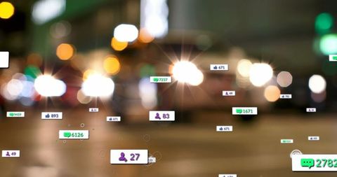 Social Media Icons Overlaying Blurred City Lights