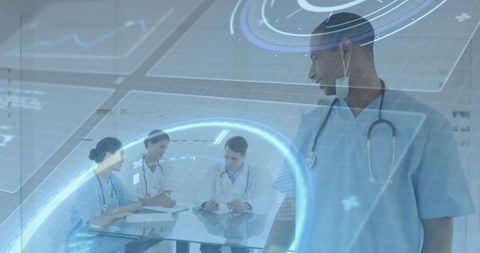 Doctor overseeing team in innovative healthcare environment