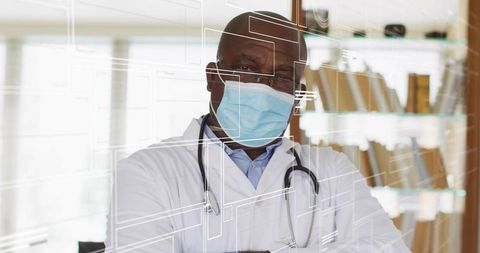 Doctor Wearing Surgical Mask and Stethoscope with Futuristic Digital Interface Overlay