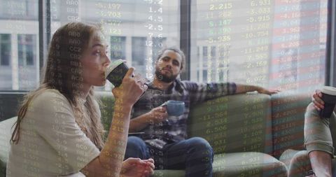 People Relaxed While Data Projections Fill Collaborative Workspace