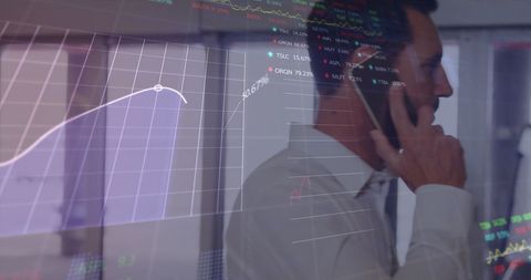 Businessman Analyzing Market Data Using Smartphone