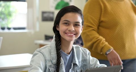 Teenage Student Engaging in Digital Learning in Classroom