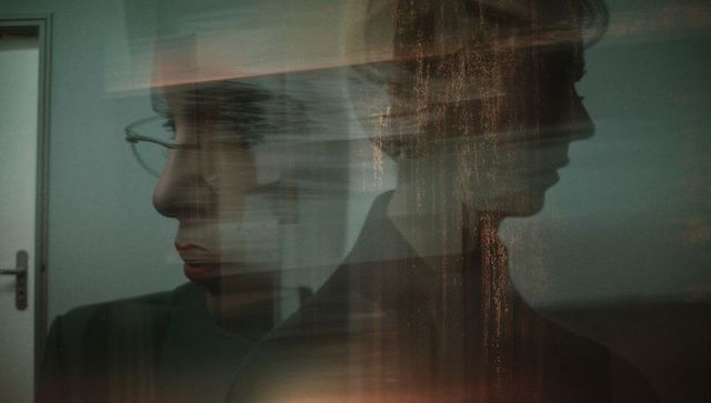 Moody Silhouette of Woman with Abstract Overlapping Elements