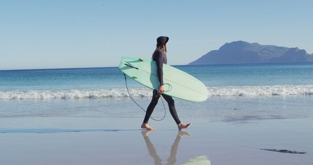 Surfer Walking on Peaceful Beach with Surfboard - Download Free Stock Images Pikwizard.com