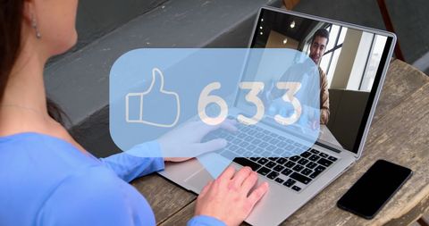 Businesswoman Engaging in Video Call with Like Counter Overlay - Download Free Stock Images Pikwizard.com