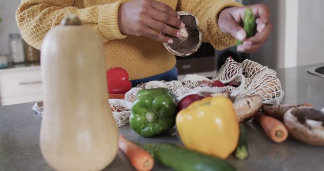 Person Organizing Fresh Vegetables on Kitchen Counter - Download Free Stock Images Pikwizard.com