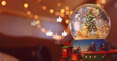 Festive Snow Globe with Social Media Thumbs Up - Download Free Stock Images Pikwizard.com