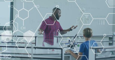 Science Teacher Engaging Students in Classroom Experiment