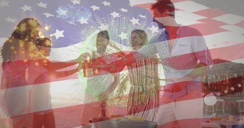 Group of friends toasting on beach with american flag overlay at sunset