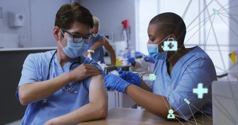 Medical Professionals Administering Vaccine amid Virtual Tech Elements