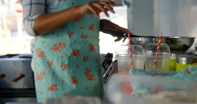 Person Cooking in Kitchen Closeup with Apron and Drinks - Download Free Stock Images Pikwizard.com