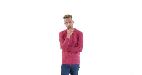 Thoughtful Man in Red Sweater Contemplating on Isolated Background