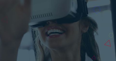 Smiling Businesswoman Engaged with Virtual Reality Technology - Download Free Stock Images Pikwizard.com