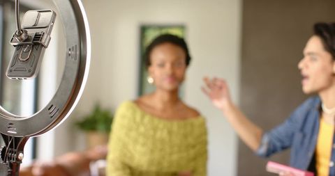 Creators Filming Beauty Tutorial Living Room with Ring Light and Phone Mount