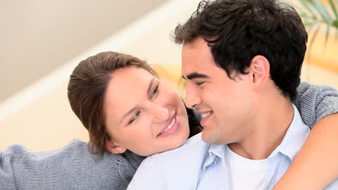 Happy Couple Relaxing and Embracing