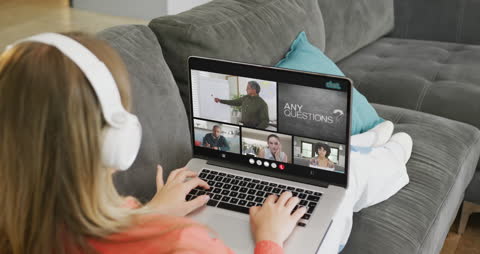 Woman Engaging in Online Learning via Video Conference