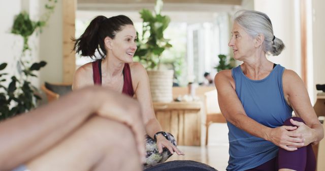 Senior and Middle-aged Women Conversing After Yoga - Download Free Stock Images Pikwizard.com