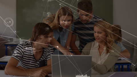 Diverse Group of Students Analyzing Digital Data on Laptop