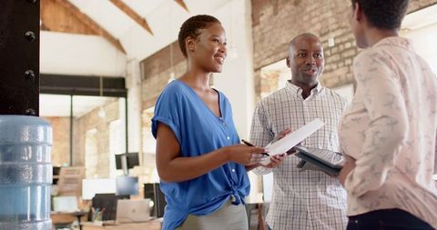 African American Business Team Collaborating in Modern Office