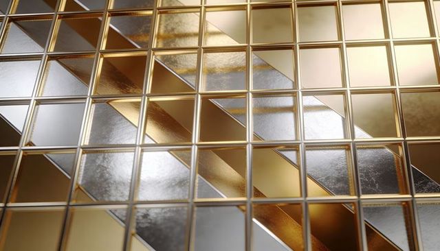 Glinting gold-framed glass mosaic grid with diagonal metallic bands for luxury design
