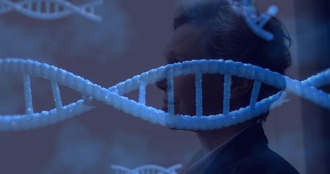 Mature woman scientist studying dna hologram for genetics research in futuristic biotech laboratory