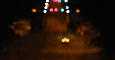 Bokeh Lights on Suspension Bridge at Night