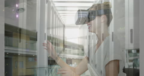 Woman Experiencing Virtual Reality in Server Room Overlay