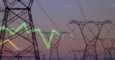 High voltage transmission towers at dusk with green and yellow energy market graph overlay