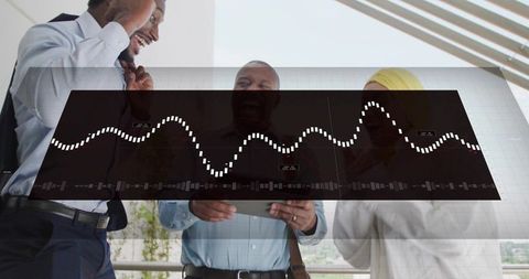Business team reviewing interactive data overlay on tablet on balcony with cityscape view