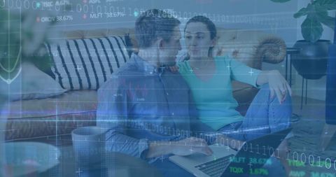 Couple Relaxing with Laptop and Holographic Data Graphics