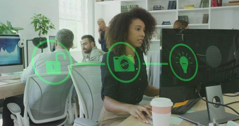 Afro-American Woman Working on Computer with Creative Digital Overlay