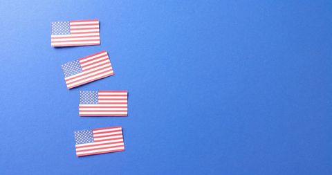 Row of American Flags on Blue Background with Copy Space - Download Free Stock Images Pikwizard.com