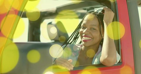 Joyful Road Trip with Smiling Woman in Red Convertible