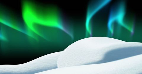Tranquil Aurora Borealis Glows Above Snowy Landscape