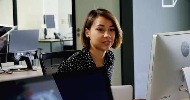 Young Professional Woman Working at Office Desk - Download Free Stock Images Pikwizard.com