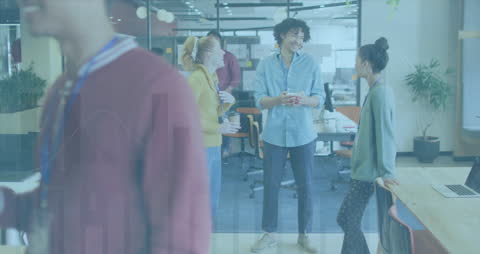 Young Professionals Networking in Modern Office