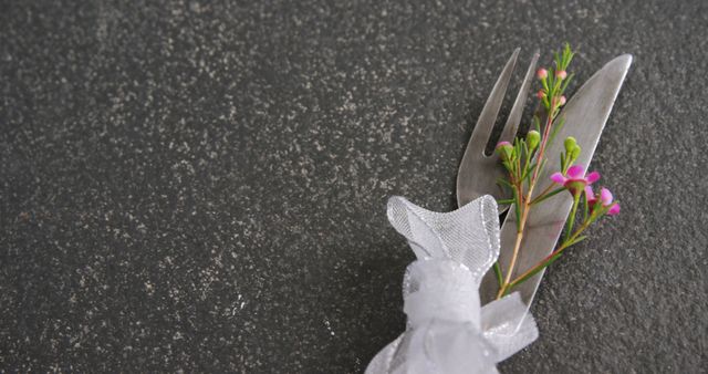 Elegant Place Setting with Floral and Fork on Dark Stone Background - Download Free Stock Images Pikwizard.com